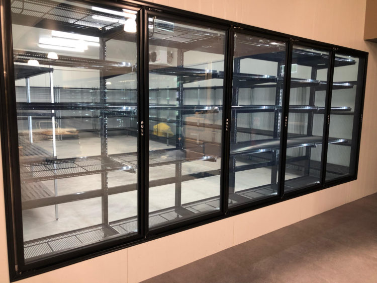 Maslen glass doors and wire shelving for cold room
